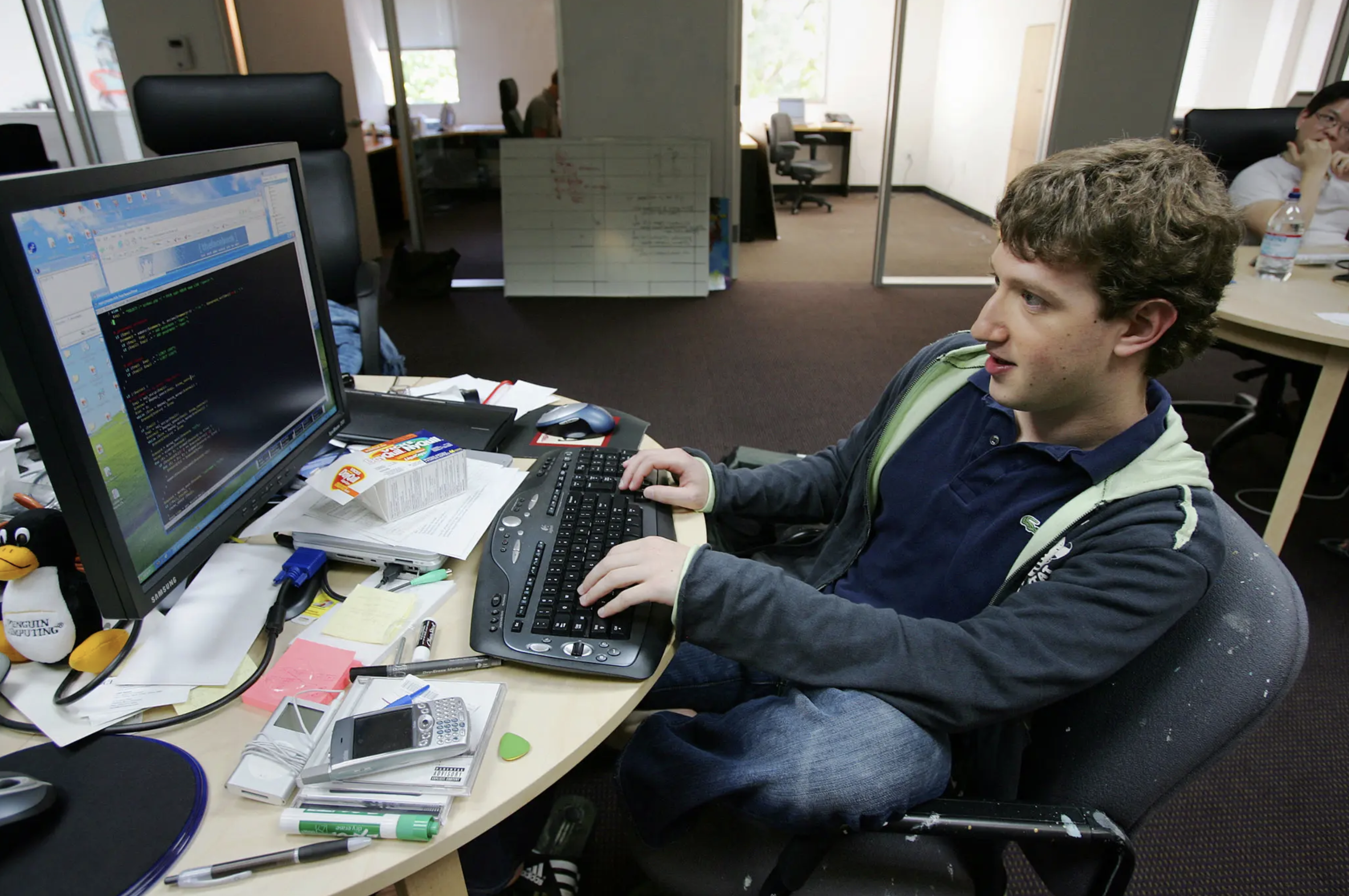 Mark Zuckerberg Working on a Computer