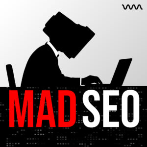 Silhouette of a person in a suit typing on a laptop, with bold 'MADSEO' text across the bottom edge.