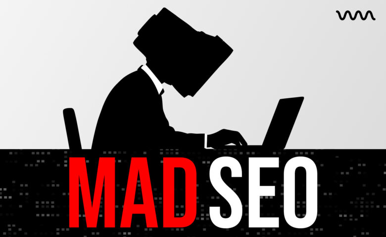 Silhouette of a person in a suit typing on a laptop, with bold red 'MAD' and white 'SEO' text across a dark banner, suggesting a MAD SEO banner or logo.